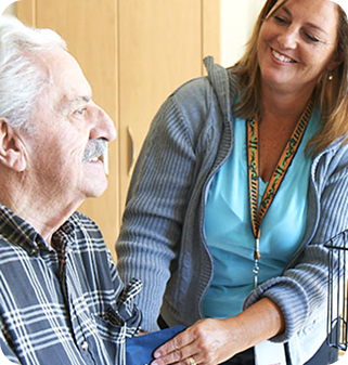 Caregiver Taking Blood Pressure